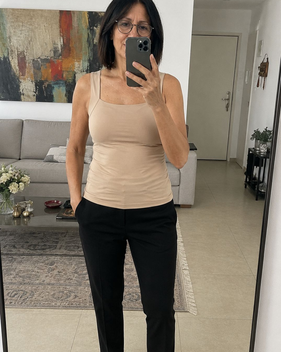 Woman styling the built-in support camisole